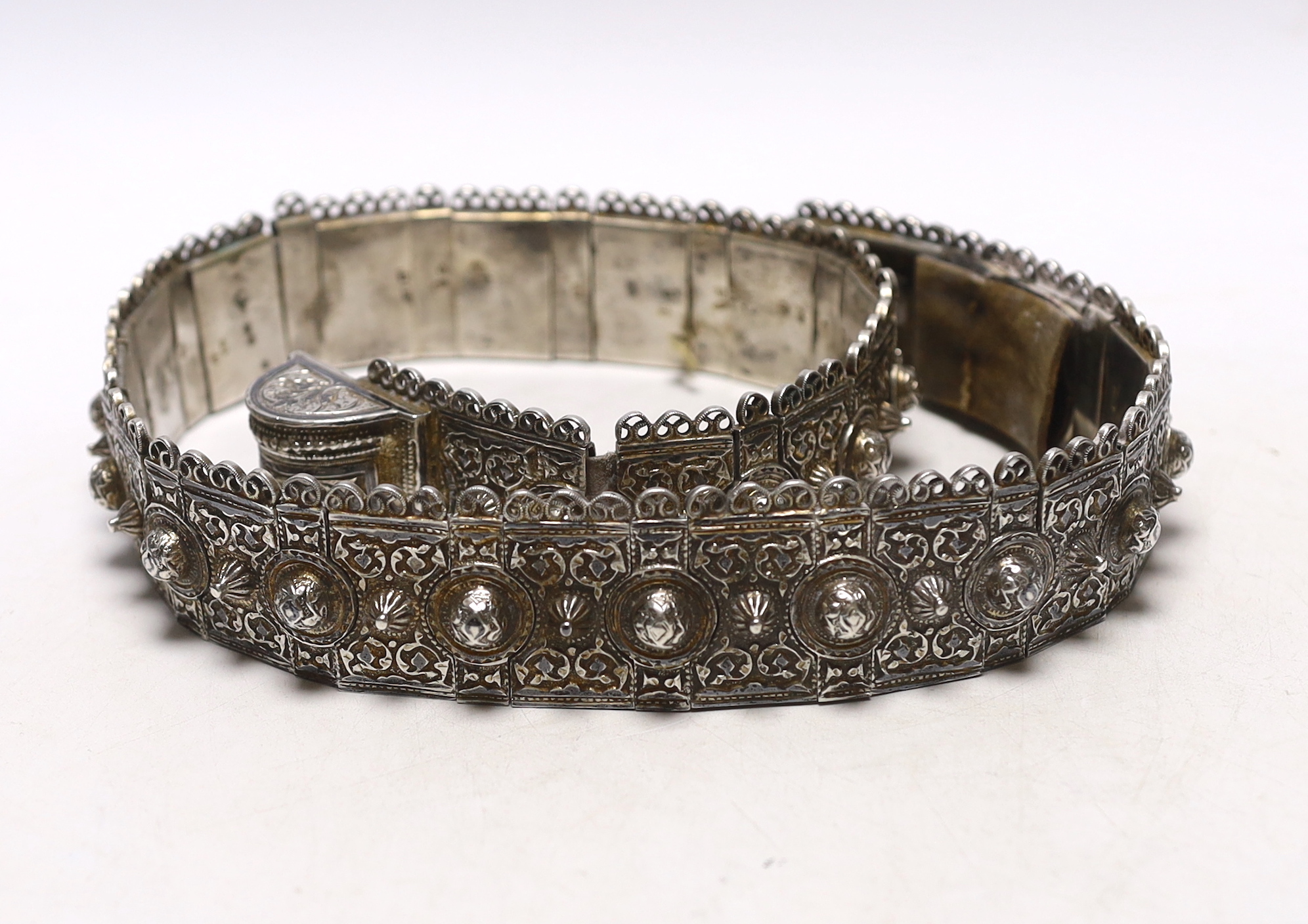 An early 20th century Russian 84 zolotnik belt, with raised conical and domed stud decoration, 79.5cm